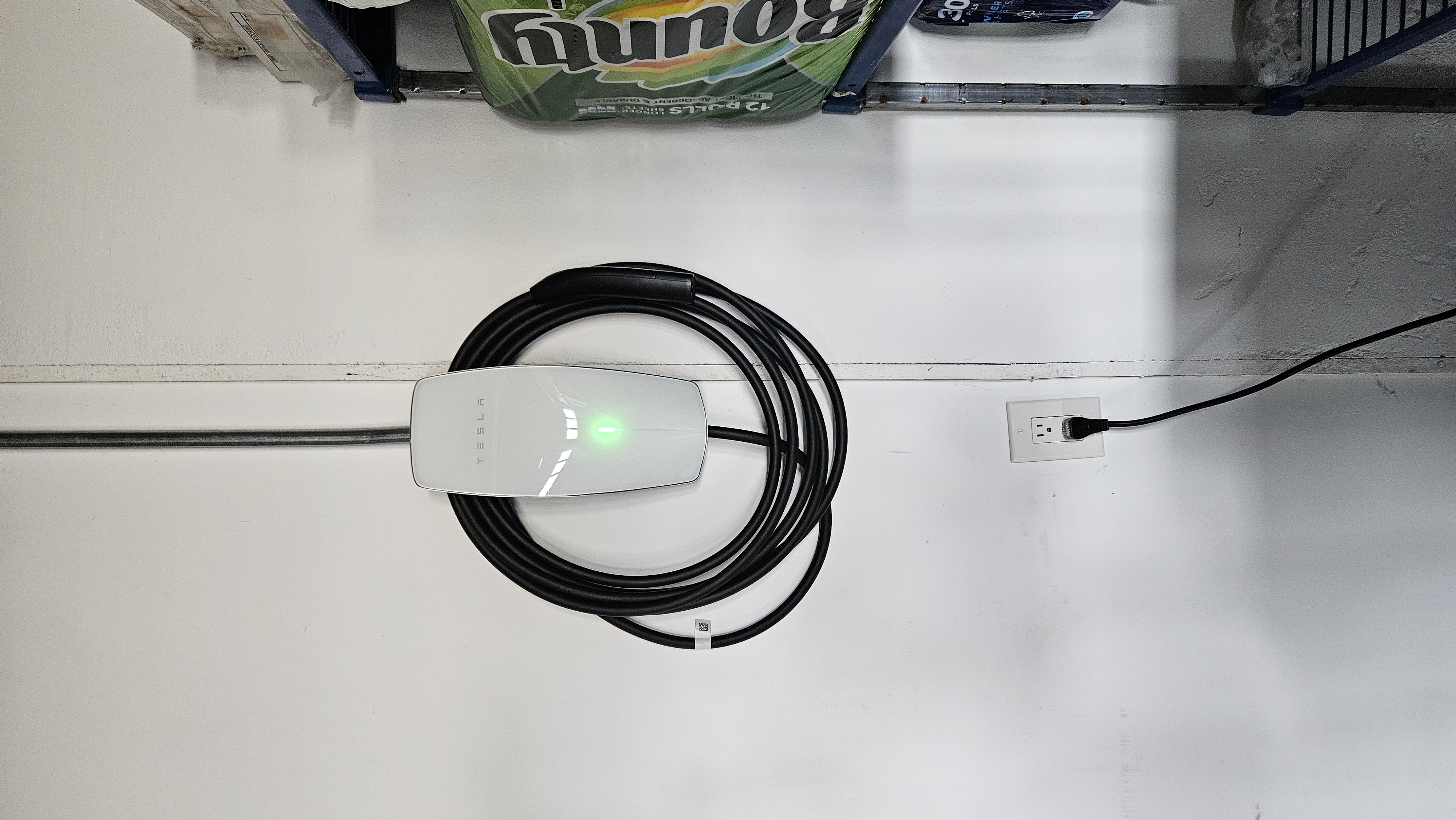 New Tesla EV charger in garage